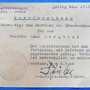1944 SS LABOR CAMP NEU-DACHS 'PASSIERSCHEIN' SIGNED BY THE CAMP COMMANDER