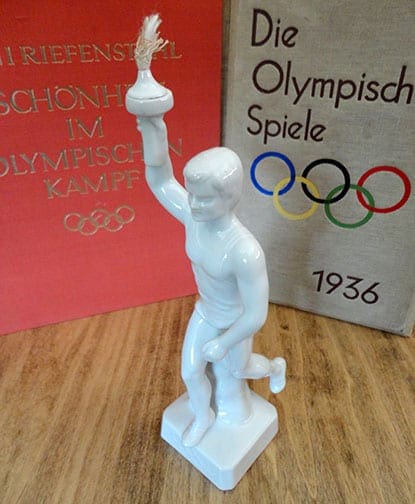 OLYMPIC GAMES PORCELAIN TORCH-BEARER STATUE